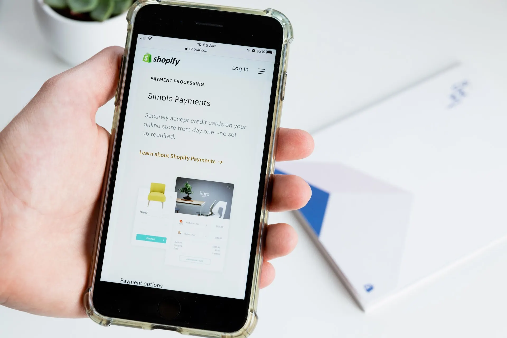 Image of a phone with shopify on it.